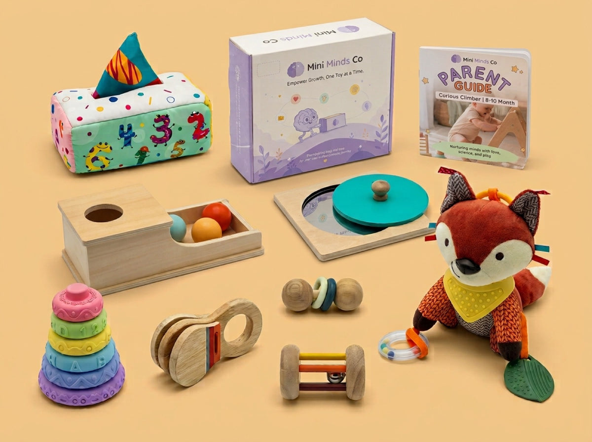 The Curious Climber bundle laid out: Parent Guide, Mini Minds Co box and eight toys for eight to ten months