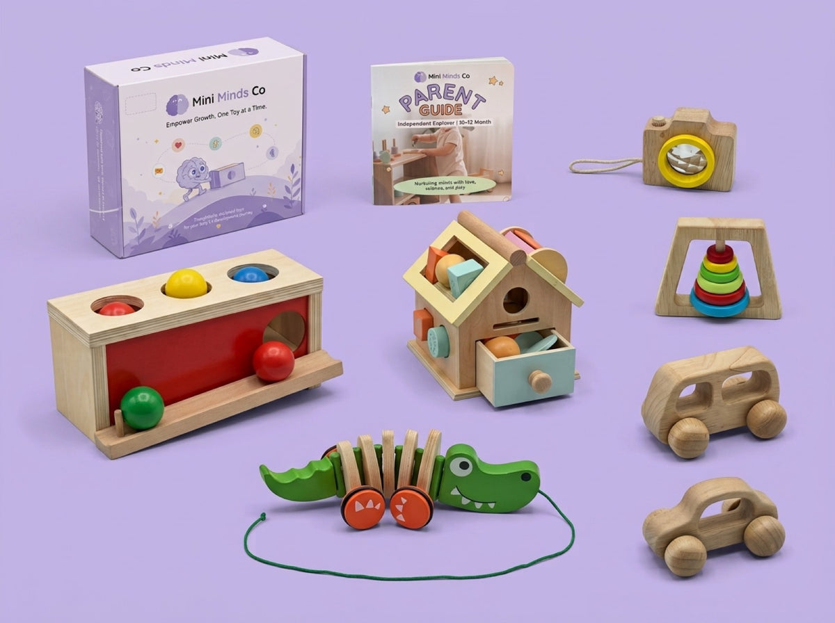 The Independent Explorer bundle laid out: Parent Guide, Mini Minds Co box and seven toys for ten to twelve months