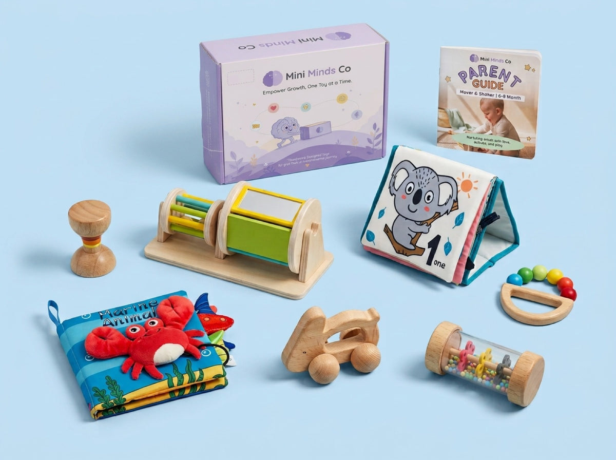 The Mover and Shaker bundle laid out: Parent Guide, Mini Minds Co box and seven toys for six to eight months